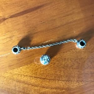 Pandora bracelet safety chain and globe charm.
